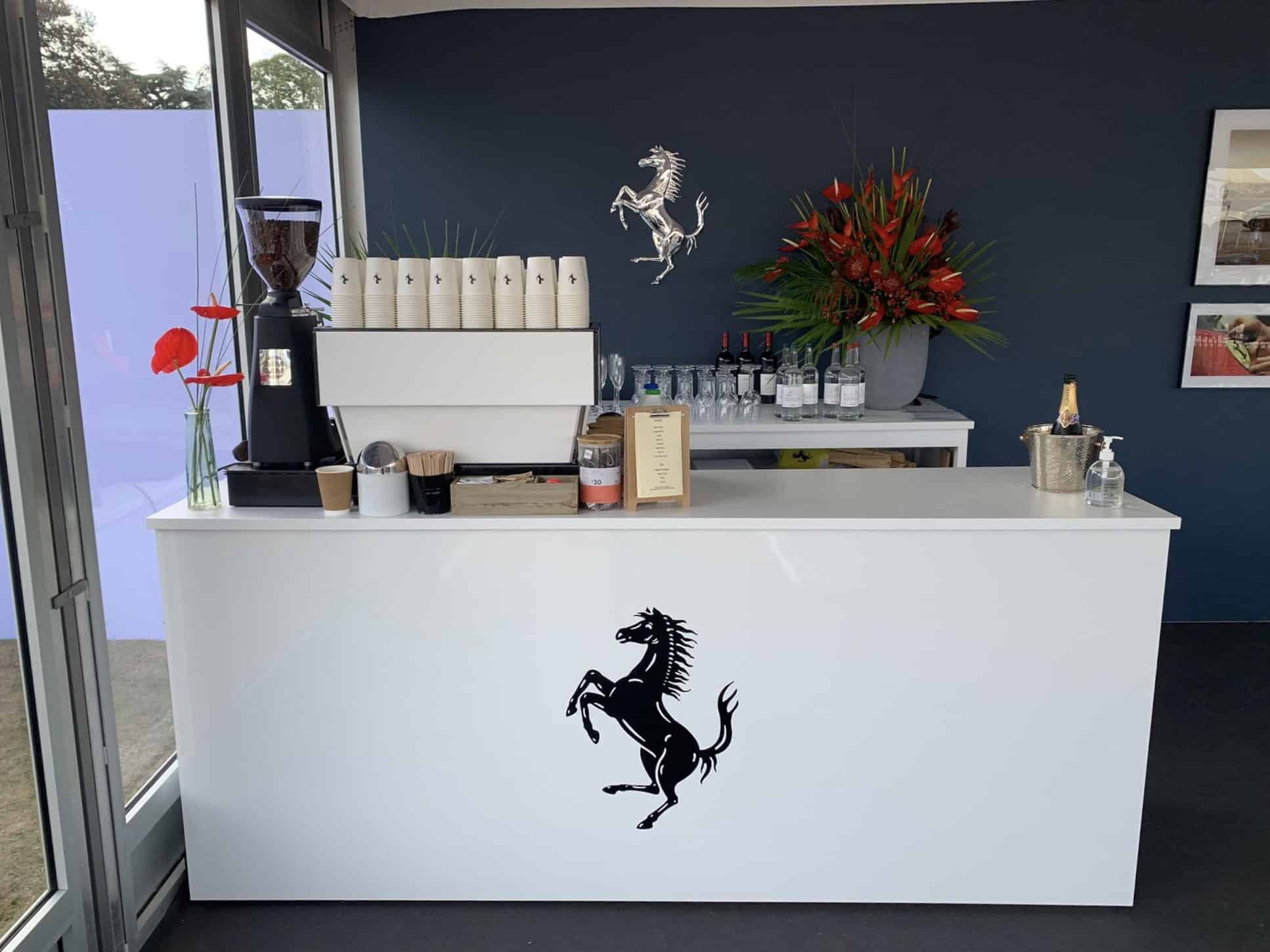 Barista bar set up with ferrari branding