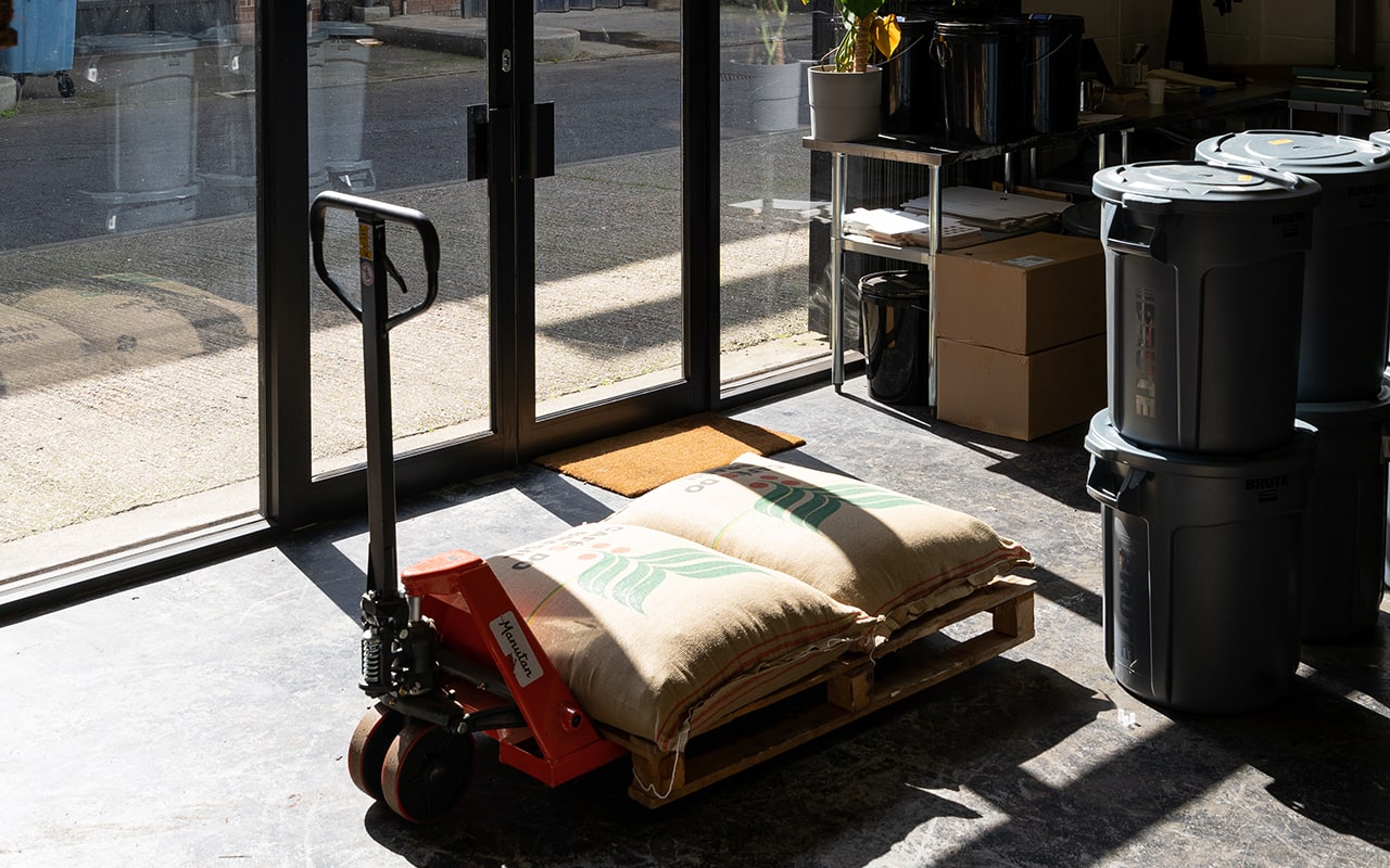 Image of a coffee roastery with coffee bags